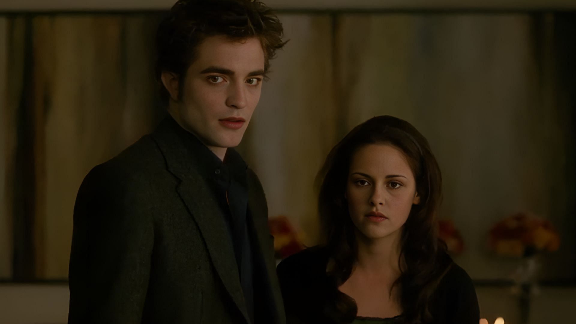 In this tense scene from The Twilight Saga, Bella’s presence unnerves the Volturi (Image via AppleTv)